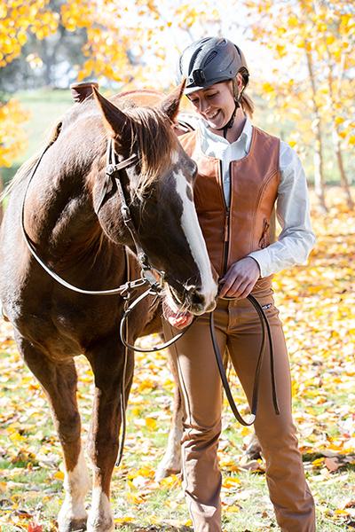 Figure hugging leather and faux suede vests to complete your equestrian style.